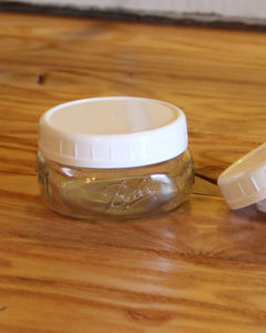 white plastic wide mouth storage cap