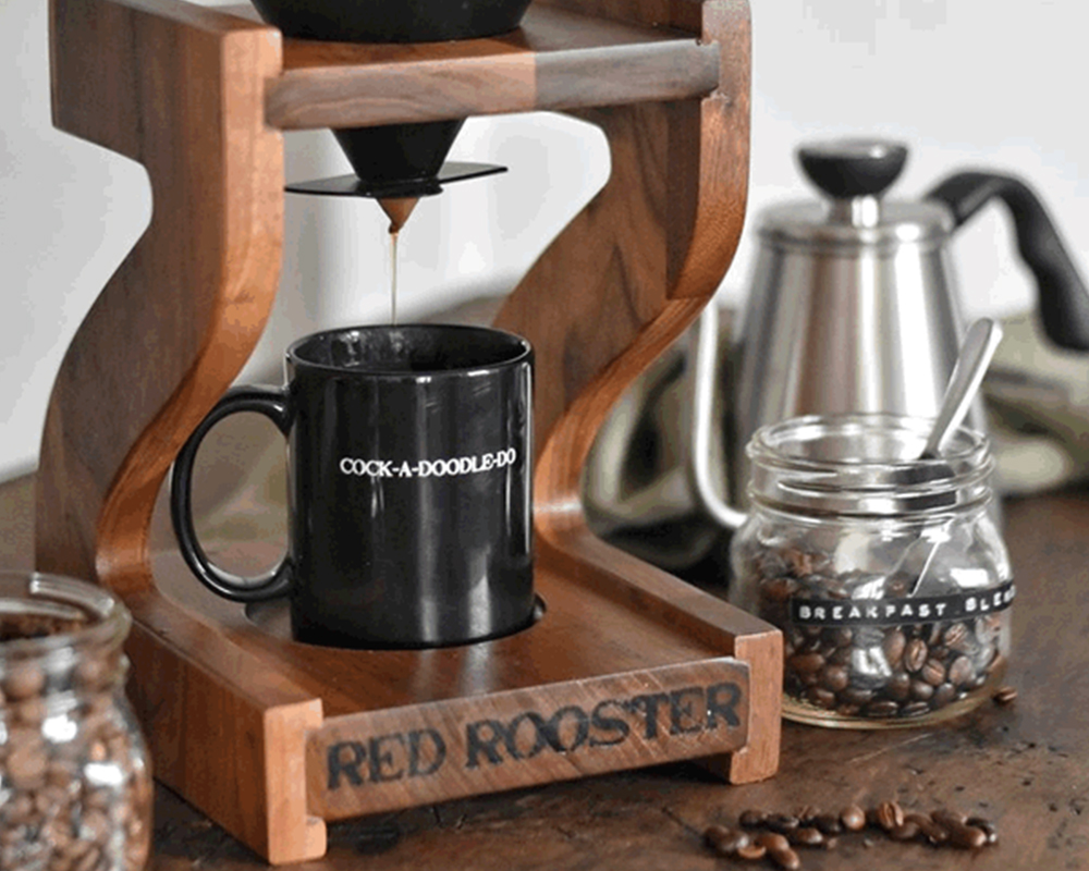 Pour over coffee brewing on a Red Rooster drip stand into a rooster mug